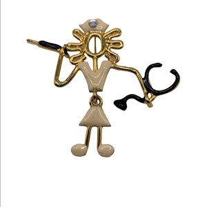 Nurse articulated brooch pin, signed KK ED